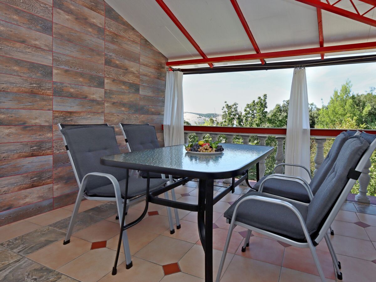 Apartment Two bedroom apartment with terrace and sea view Lopar, Rab A-18001-a