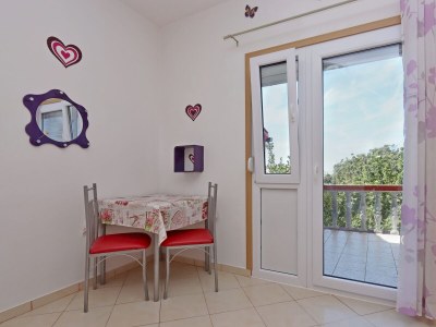 Apartment Two bedroom apartment with terrace and sea view Lopar, Rab A-18001-a - Outdoor photo 4