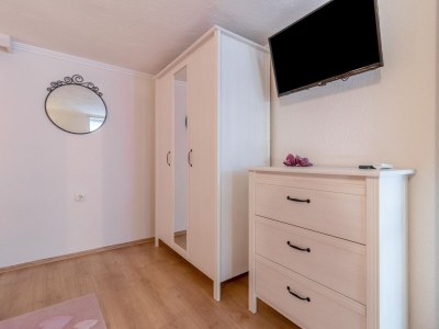 Apartment Two bedroom apartment with terrace Banjol, Rab A-19804-a - Outdoor photo 32