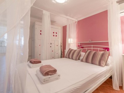 Apartment Two bedroom apartment with terrace Banjol, Rab A-19804-a - Outdoor photo 34