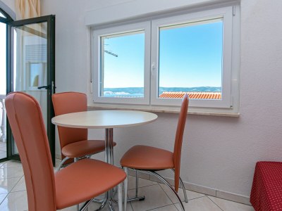 Apartment Studio flat with terrace and sea view Stanići, Omiš AS-19941-b in Omis - Apartment