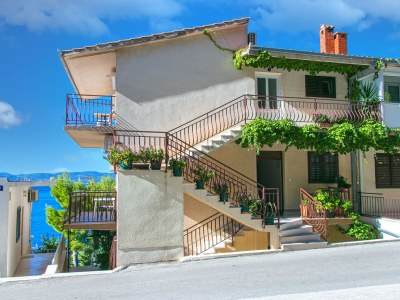Apartment Three bedroom apartment with terrace and sea view Brela, Makarska A-20075-a - Outdoor photo 4