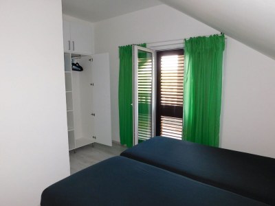Apartment Three bedroom apartment with air-conditioning Povlja, Brač A-21089-c - Outdoor photo 11