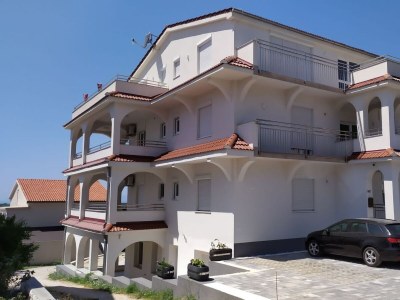 Apartment Two bedroom apartment with terrace and sea view Banjol, Rab A-21159-b - Outdoor photo 8