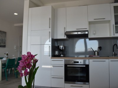 Apartment Two bedroom apartment with terrace and sea view Banjol, Rab A-21159-b - Outdoor photo 12