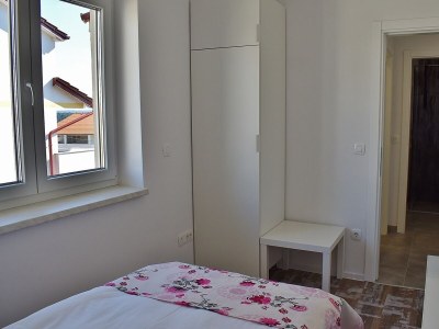 Apartment Two bedroom apartment with terrace and sea view Banjol, Rab A-21159-b - Outdoor photo 16