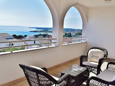 Apartment Two bedroom apartment with terrace and sea view Banjol, Rab A-21159-b - Outdoor photo 23
