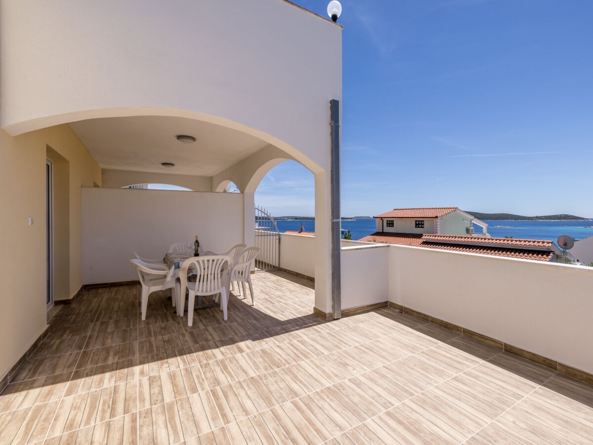 Apartment Two bedroom apartment with terrace and sea view Sevid, Trogir A-21163-a