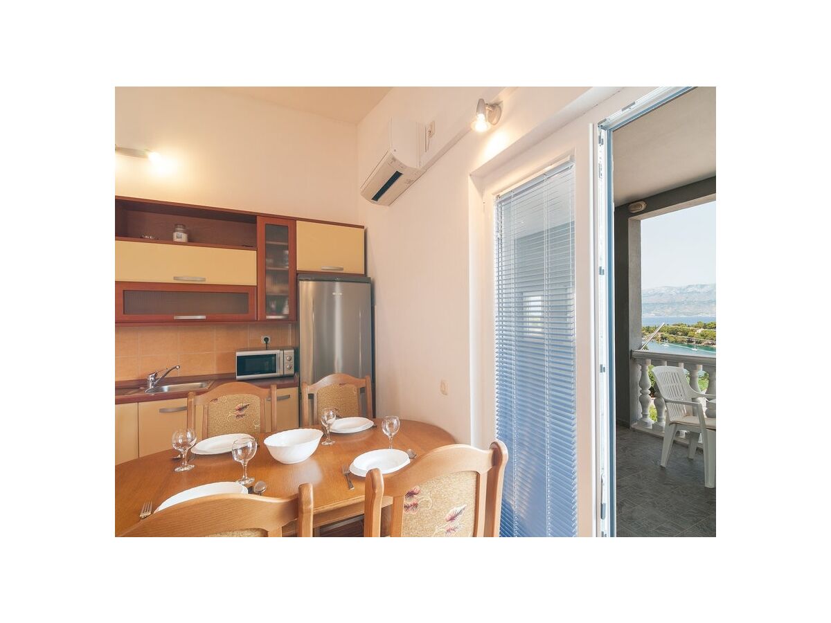 Apartment One bedroom apartment with terrace and sea view Splitska, Brač A-21974-d