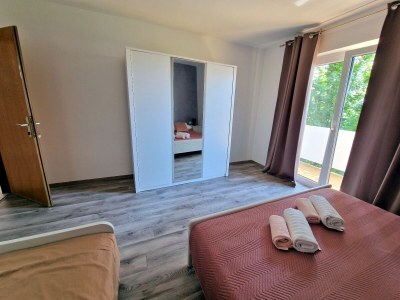 Apartment Two bedroom apartment with terrace and sea view Barbat, Rab A-22167-a - Outdoor photo 12