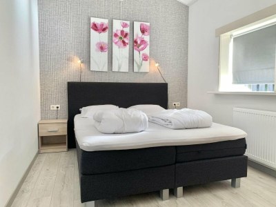 Holiday house Renovated bungalow with garden - Features photo 24