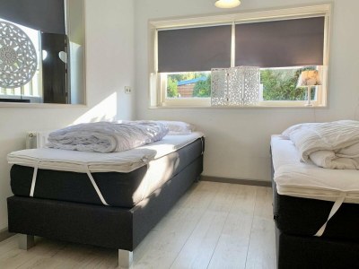 Holiday house Renovated bungalow with garden - Features photo 25