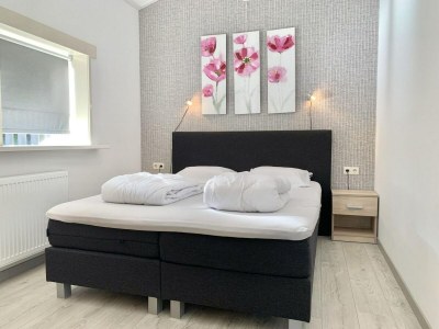 Holiday house Renovated bungalow with garden - Features photo 27