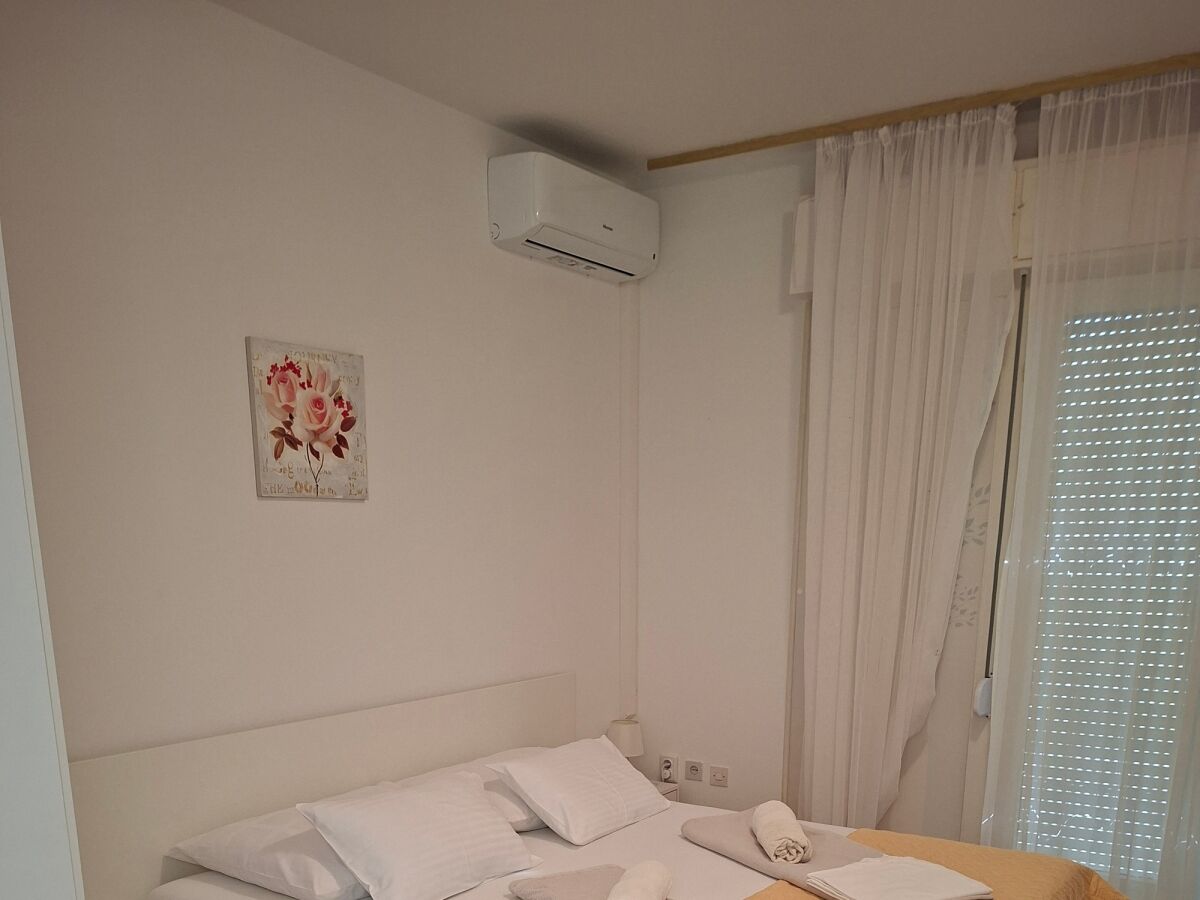 Holiday room with balcony Palit, Rab S-22221-c