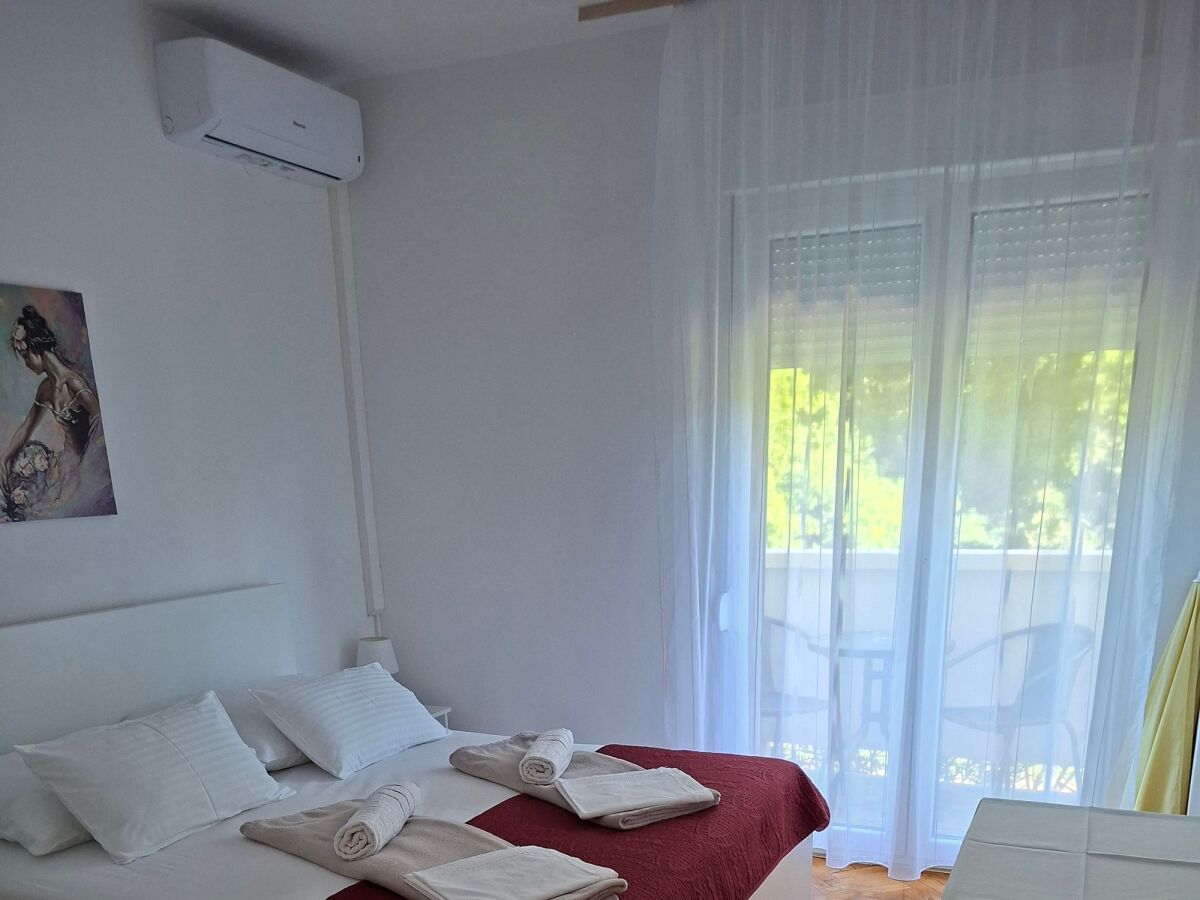 Holiday room with balcony Palit, Rab S-22221-d