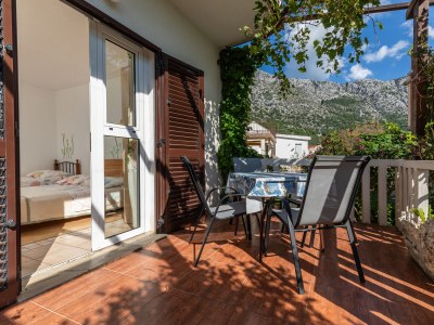 Apartment Studio flat with terrace Igrane, Makarska AS-22690-d in Igrane - Apartment
