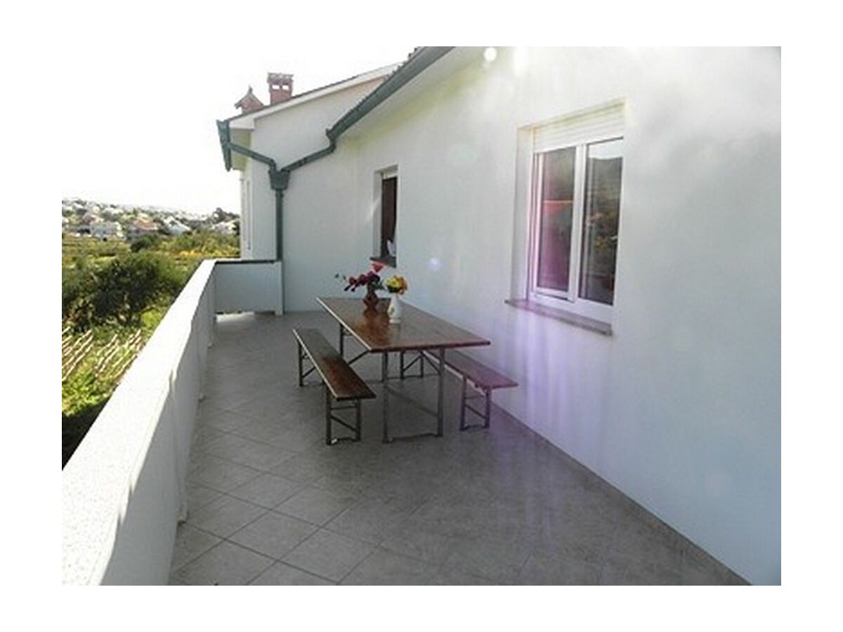 Apartment Three bedroom apartment with terrace and sea view Banjol, Rab A-16645-b