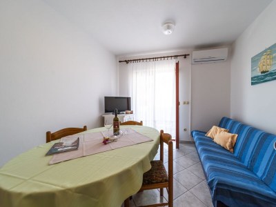 Apartment Two bedroom apartment with terrace and sea view Rab A-24367-a - Outdoor photo 8