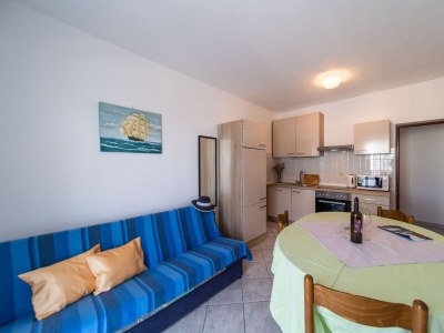 Apartment Two bedroom apartment with terrace and sea view Rab A-24367-a - Outdoor photo 9