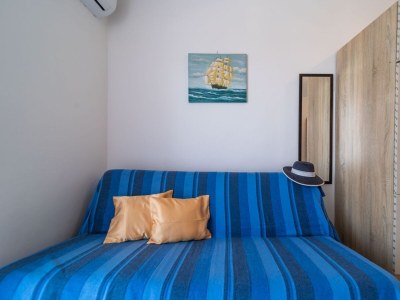 Apartment Two bedroom apartment with terrace and sea view Rab A-24367-a - Outdoor photo 11