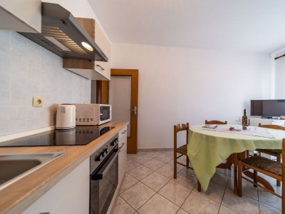 Apartment Two bedroom apartment with terrace and sea view Rab A-24367-a - Outdoor photo 12