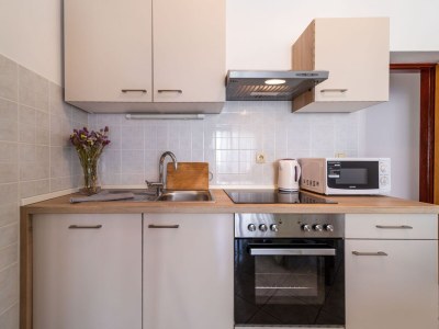 Apartment Two bedroom apartment with terrace and sea view Rab A-24367-a - Outdoor photo 14