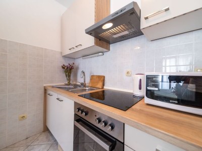 Apartment Two bedroom apartment with terrace and sea view Rab A-24367-a - Outdoor photo 15