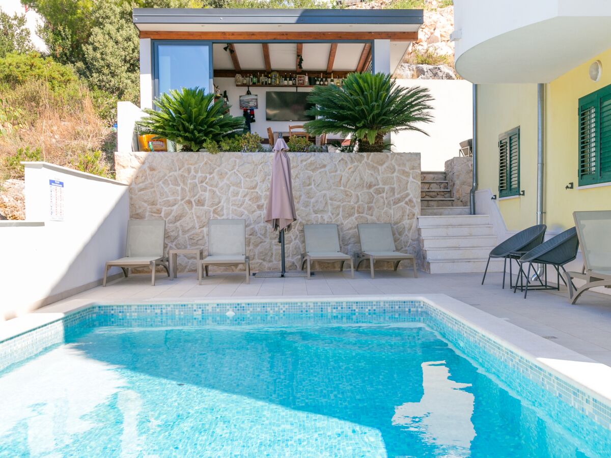 Apartment Two bedroom apartment with terrace and sea view Seget Vranjica, Trogir A-24447-b