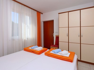 Apartment Two bedroom apartment with terrace and sea view Barbat, Rab A-24215-a - Outdoor photo 18