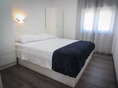 Apartment Two bedroom apartment with terrace and sea view Palit, Rab A-4971-c - Outdoor photo 17