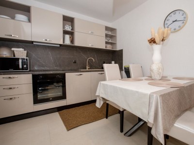 Apartment Two bedroom apartment with terrace Banjol, Rab A-5041-a - Outdoor photo 11