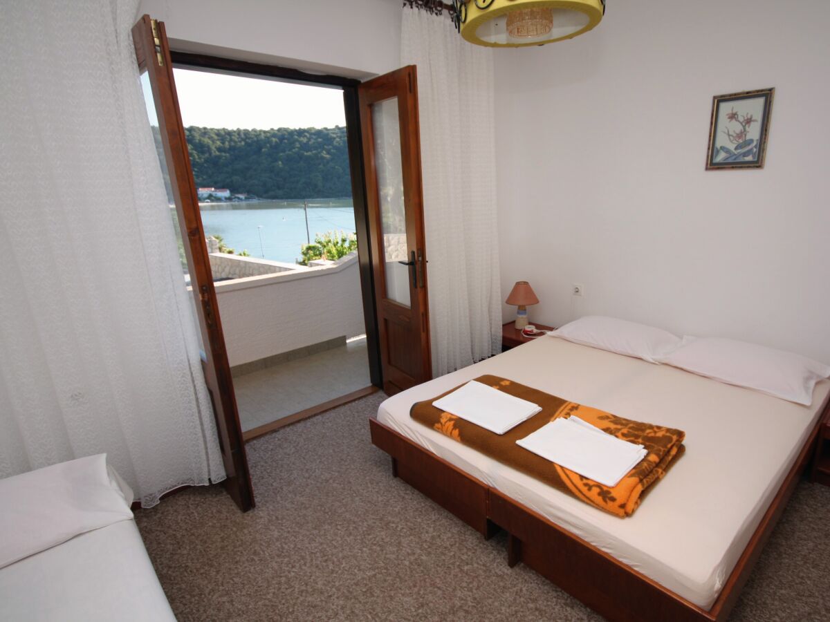Apartment Four-bedroom apartment with terrace and sea view Kampor, Rab A-5051-a