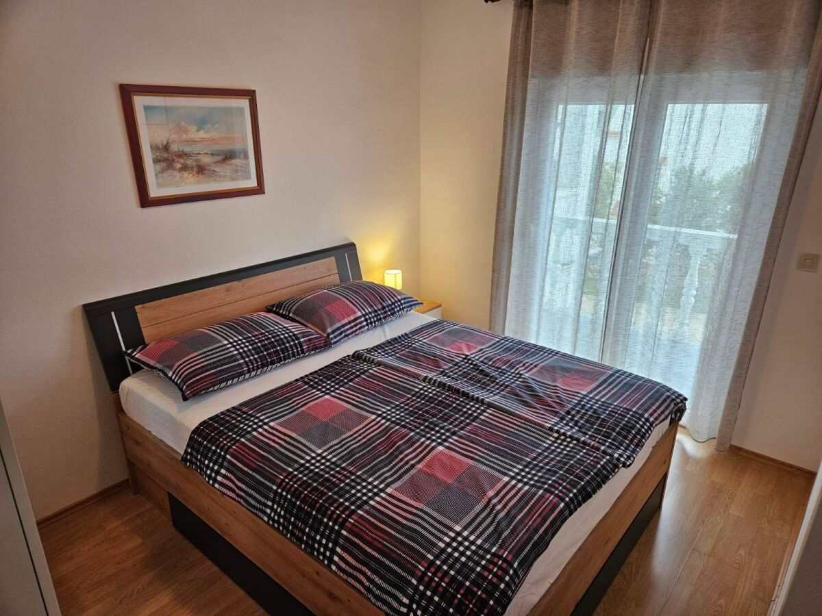 Apartment Two bedroom apartment with balcony and sea view Barbat, Rab A-4951-c