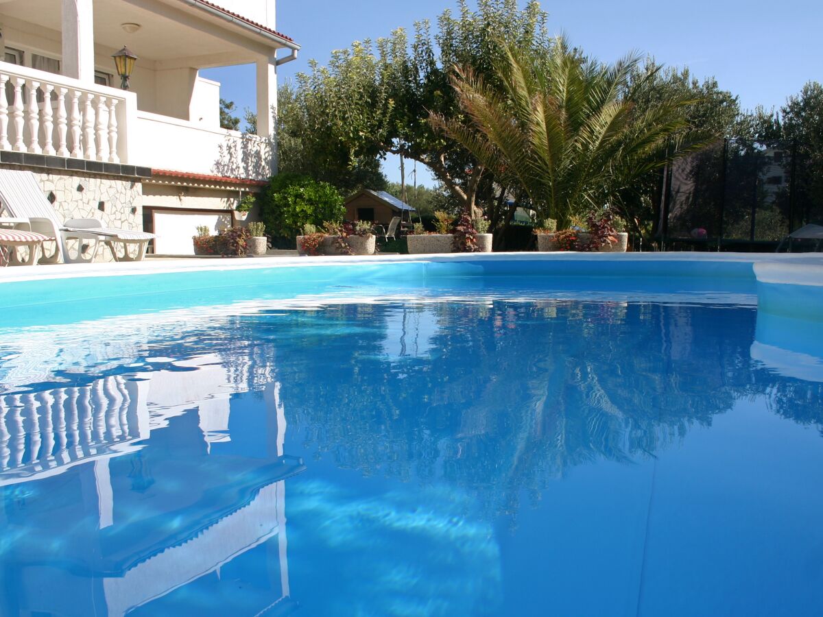 Apartment Two bedroom apartment with terrace and sea view Barbat, Rab A-4951-e