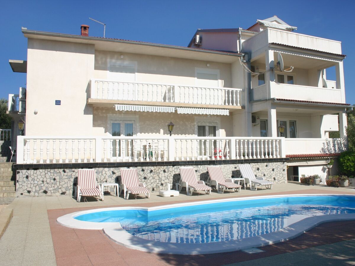 Apartment Two bedroom apartment with terrace and sea view Barbat, Rab A-4951-e - Outdoor photo 2