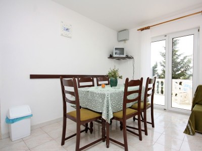 Apartment Two bedroom apartment with terrace and sea view Barbat, Rab A-4962-a - Outdoor photo 13