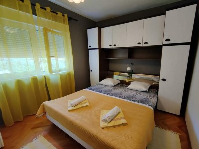 Apartment Four-bedroom apartment with terrace Mundanije, Rab A-23299-a - Outdoor photo 12