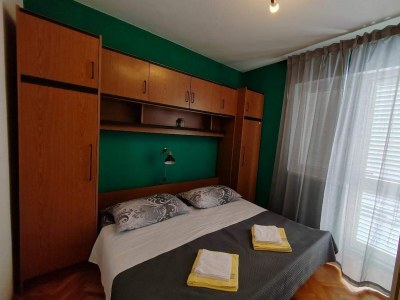 Apartment Four-bedroom apartment with terrace Mundanije, Rab A-23299-a - Outdoor photo 15