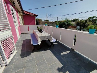 Apartment Four-bedroom apartment with terrace Mundanije, Rab A-23299-a - Outdoor photo 20