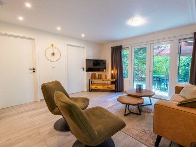 Chalet Vakantiepark De Wiltzangh- Houtenborg Lodge Hottub - Features photo 4