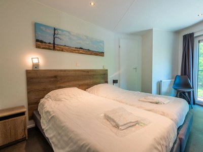 Chalet Vakantiepark De Wiltzangh - Bosrand Wellness Cabin - Features photo 10