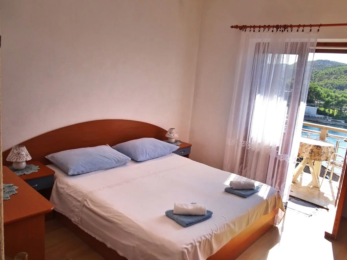 Apartment Two bedroom apartment with balcony and sea view Povlja, Brač A-14399-c