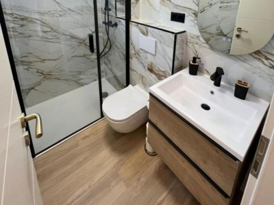 Apartment Four-Bedroom Apartment With Sea View - Features photo 13