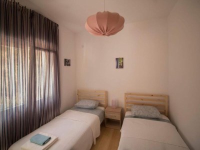 Holiday house Four Bedroom Holiday Home with Pool - Features photo 14