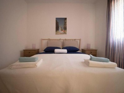 Holiday house Four Bedroom Holiday Home with Pool - Features photo 15