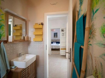 Holiday house Four Bedroom Holiday Home with Pool - Features photo 18