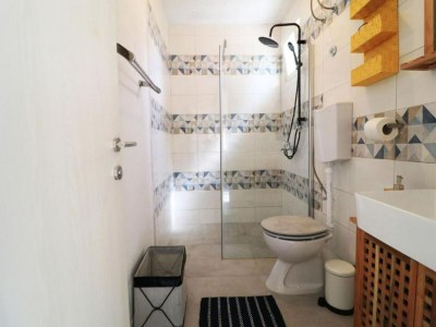 Holiday house Four Bedroom Holiday Home with Pool - Features photo 19