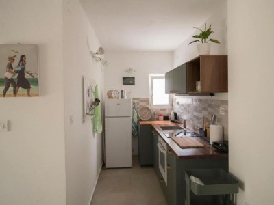 Holiday house Four Bedroom Holiday Home with Pool - Features photo 21