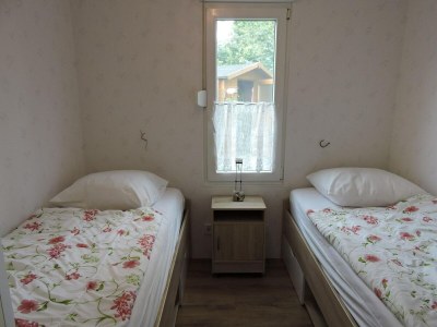 Holiday house niedliche Ferienunterkunft mit Wintergarten, Meidoorn 7, Sint Maartenszee - Outdoor photo 8