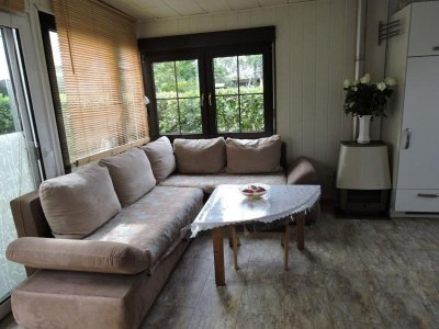 Holiday house niedliche Ferienunterkunft mit Wintergarten, Meidoorn 7, Sint Maartenszee - Outdoor photo 11